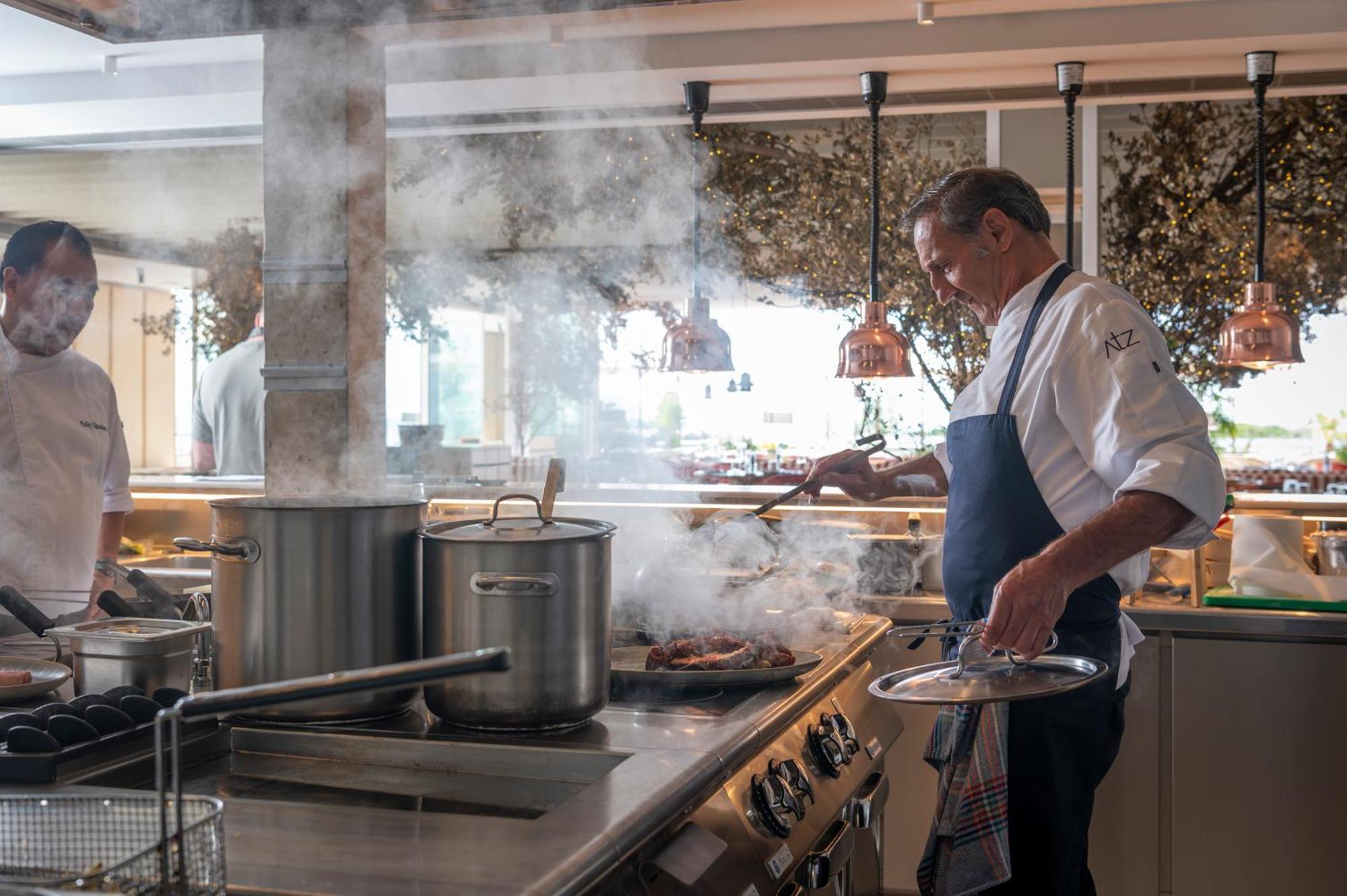 Atzavara Hotel & Spa Santa Susanna Exterior photo Chef preparing food